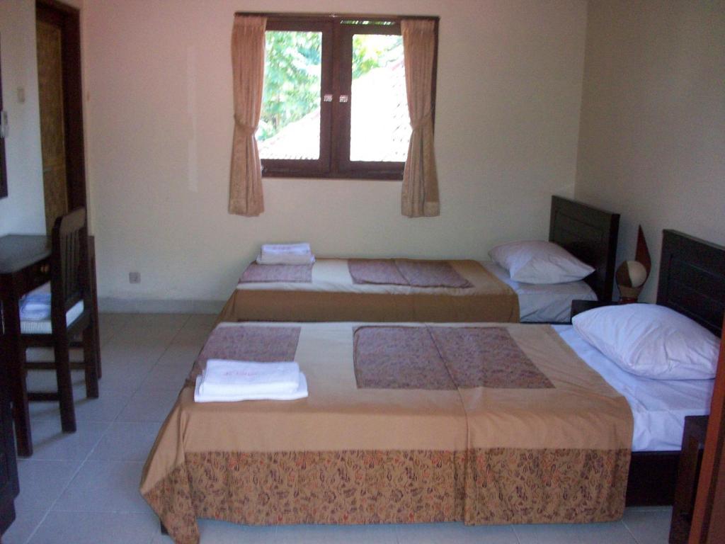 Hotel Petit Boo Amed Pokoj fotografie